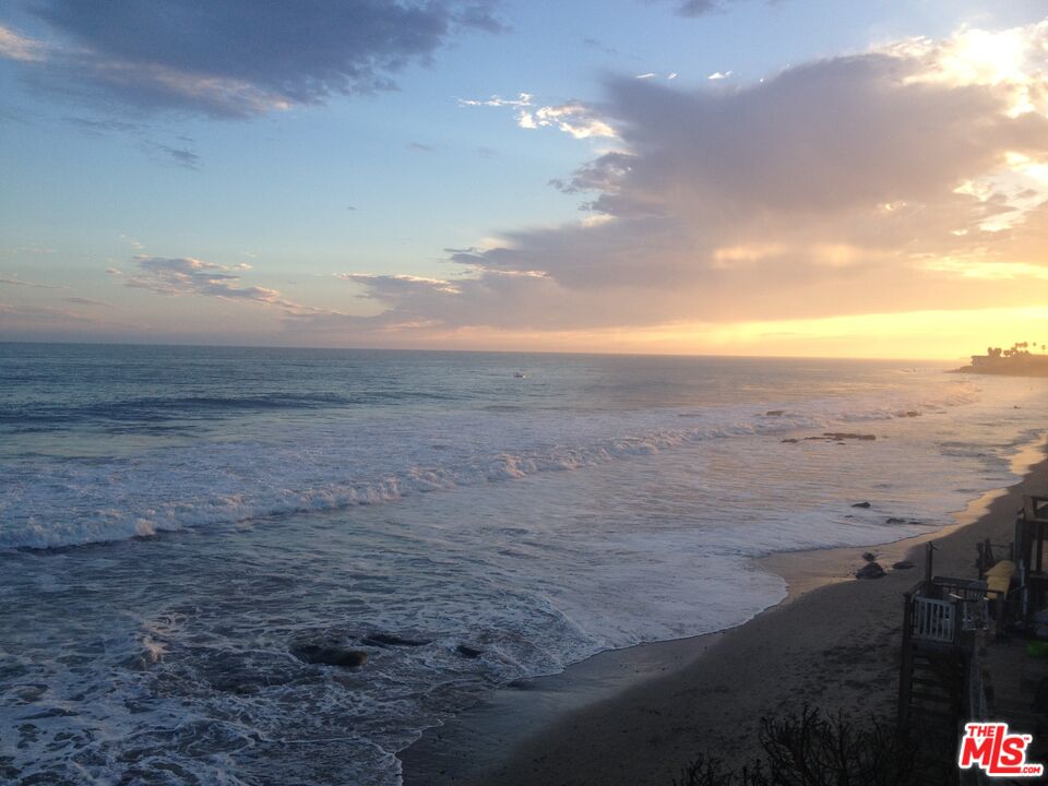 a view of yard with ocean view