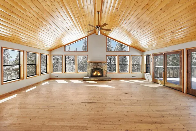 a view of a livingroom with a furniture and staircase