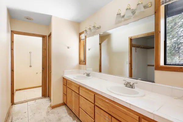 a view of an empty room with a window