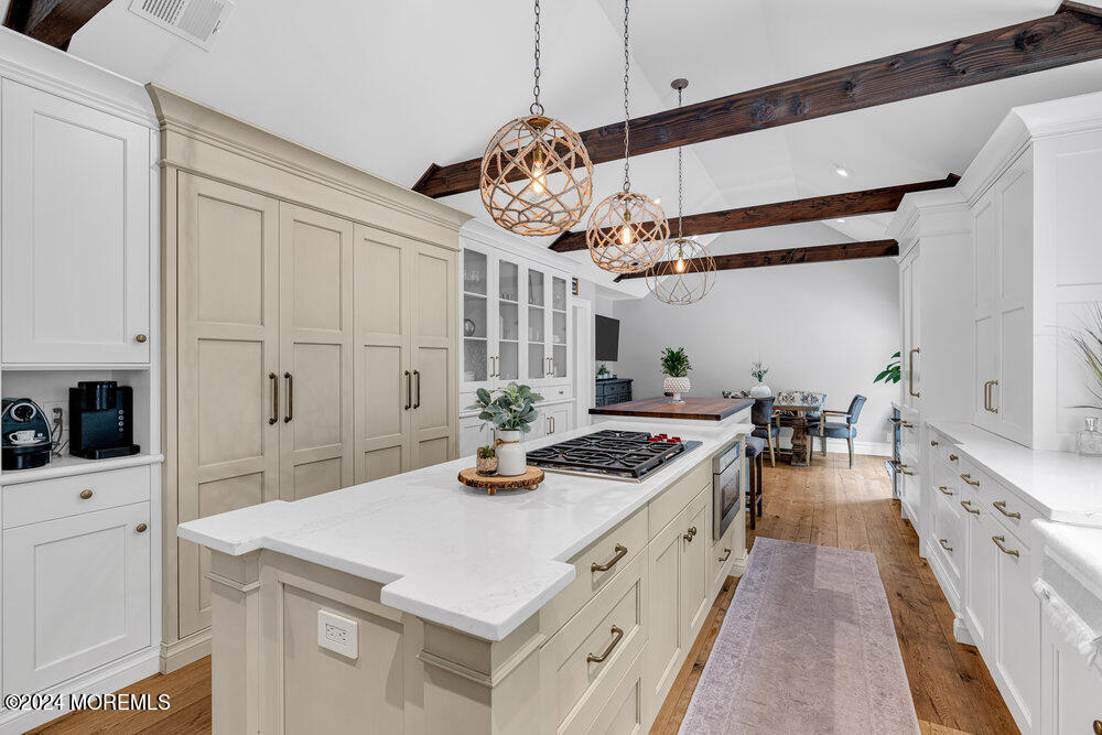 921 Lovett Road Colts Neck, NJ 07722 - Photo 11 of 55 a kitchen with a stove a sink and a refrigerator