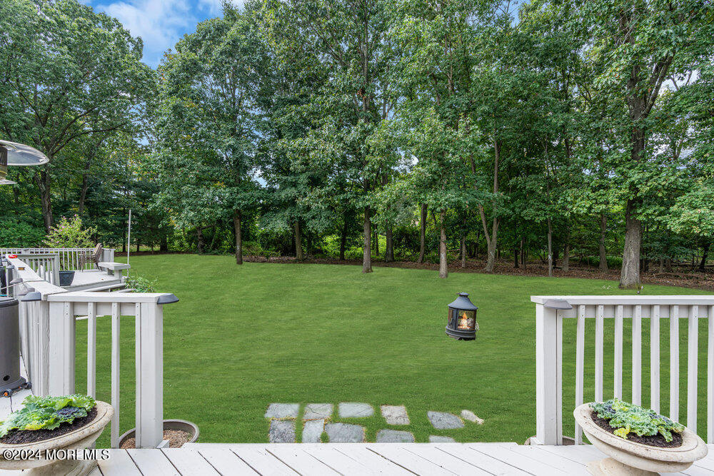 921 Lovett Road Colts Neck, NJ 07722 - Photo 51 of 55 a view of a house with a backyard