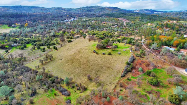 a view of a lake with mountains in the background