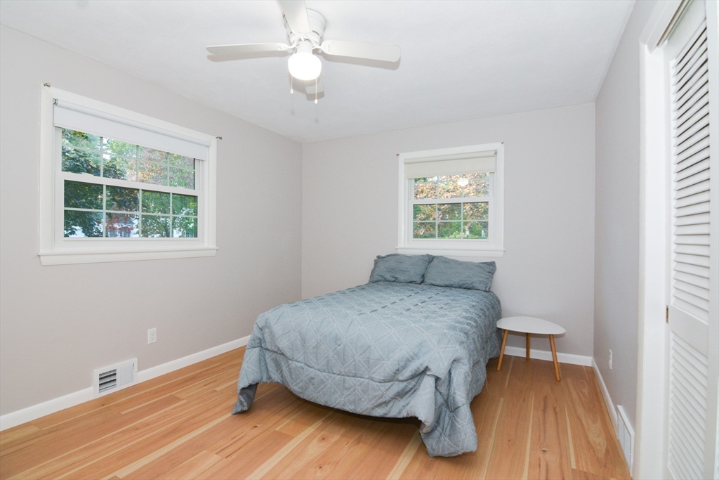 157 Captain Road Longmeadow, MA 01106 - Photo 27 of 41 a bedroom with a bed and a window