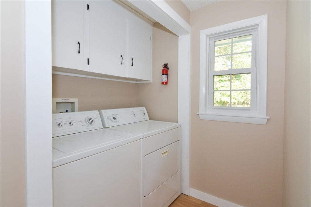 157 Captain Road Longmeadow, MA 01106 - Photo 32 of 41 a utility room with dryer and washer