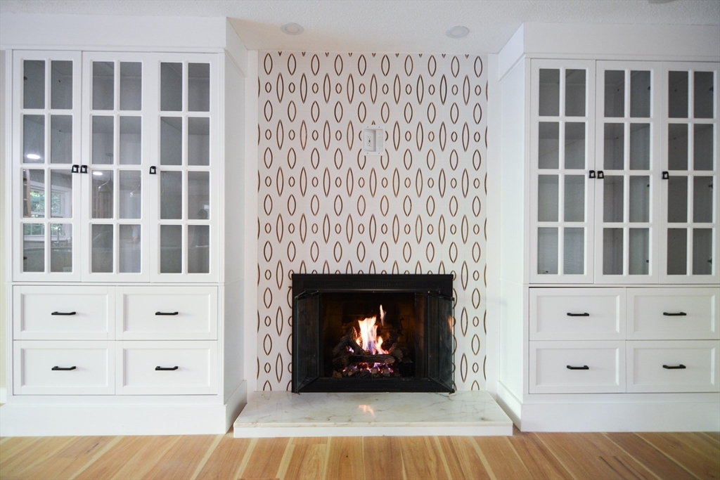 157 Captain Road Longmeadow, MA 01106 - Photo 8 of 41 a living room with a fireplace