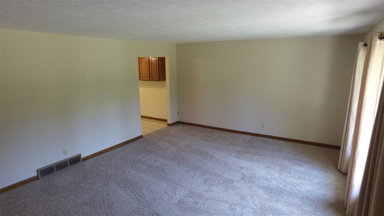 5701 Tipple Road Rockford, IL 61102 - Photo 11 of 21 an empty room with windows
