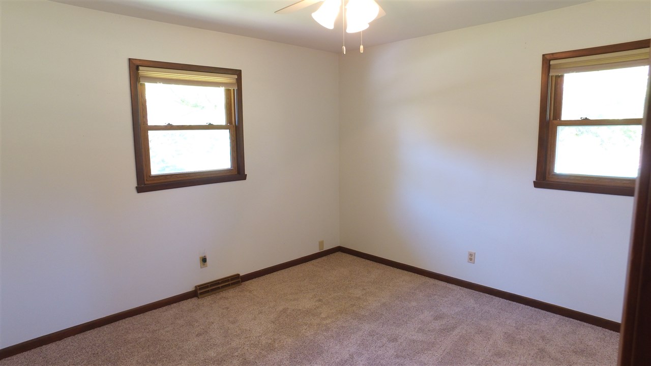 5701 Tipple Road Rockford, IL 61102 - Photo 14 of 21 an empty room with a window