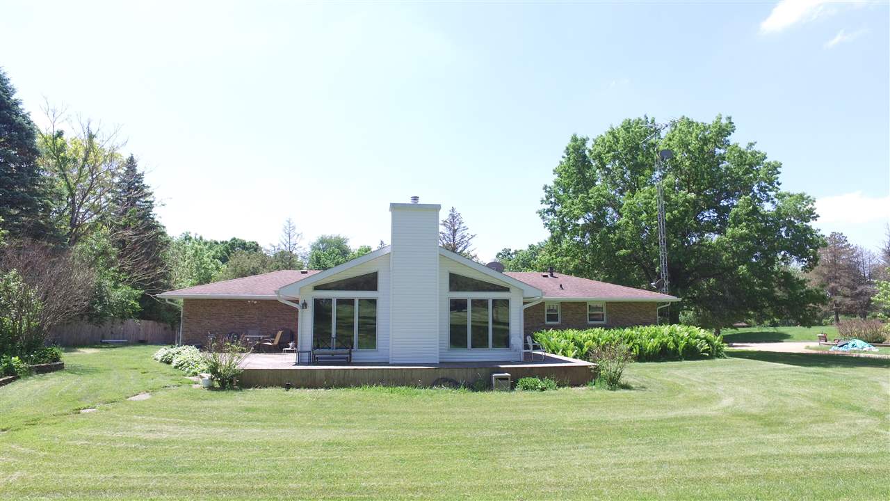 5701 Tipple Road Rockford, IL 61102 - Photo 19 of 21 a front view of a house with garden