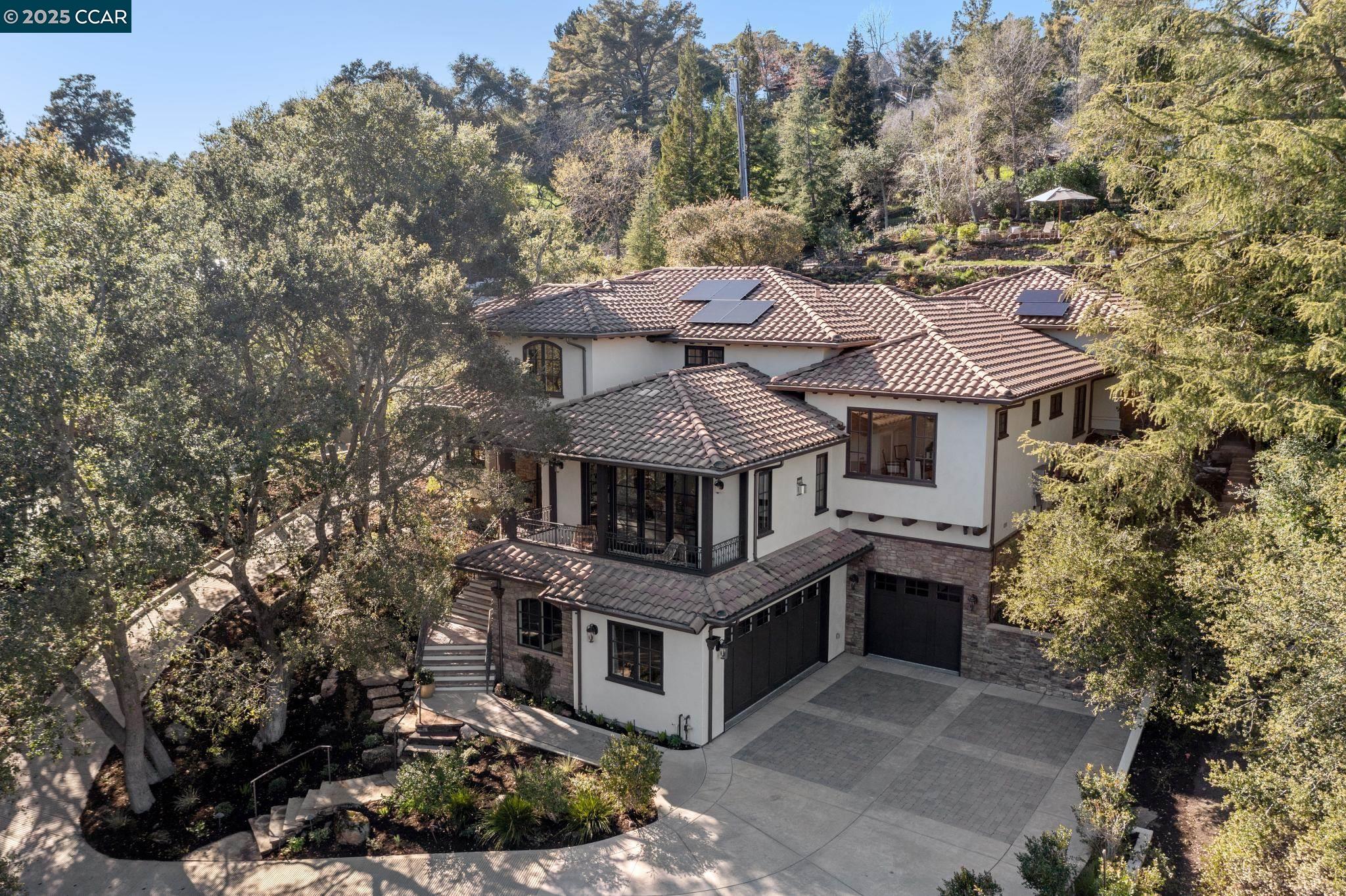 1121 Rahara Drive Lafayette, CA 94549 - Photo 1 of 1 a view of a house with a small yard plants and large tree