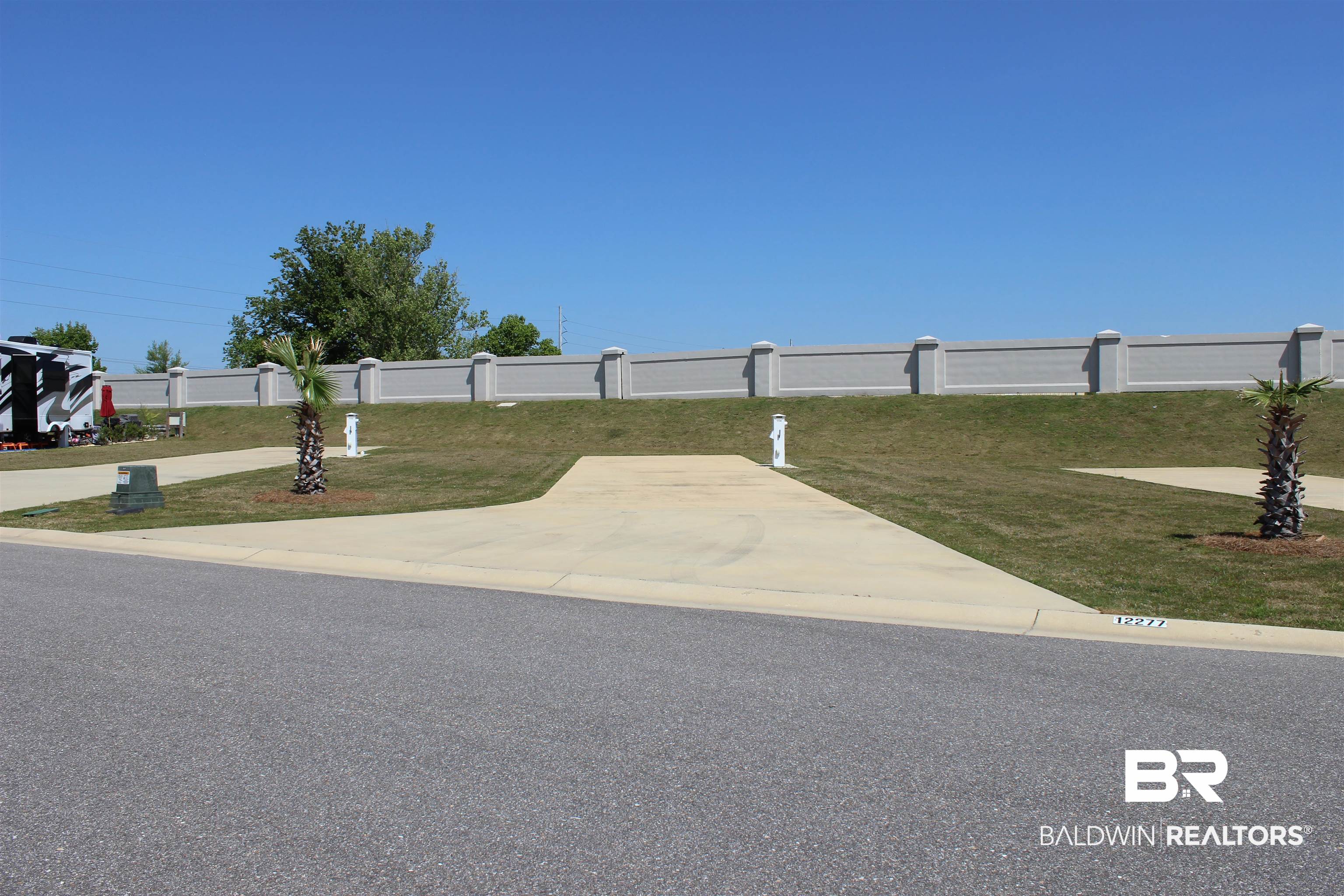12277 Gateway Drive Elberta, AL 36530 - Photo 2 of 54 View of yard featuring fence