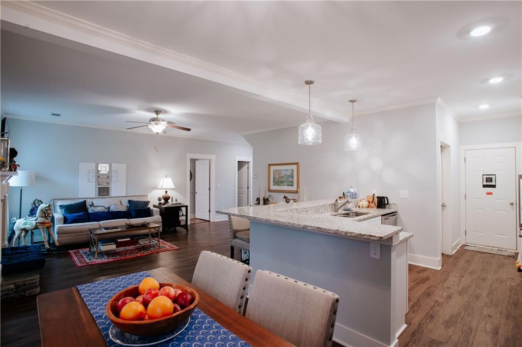 3221 Hollonville Road Williamson, GA 30292 - Photo 13 of 46 a living room with furniture and a wooden floor