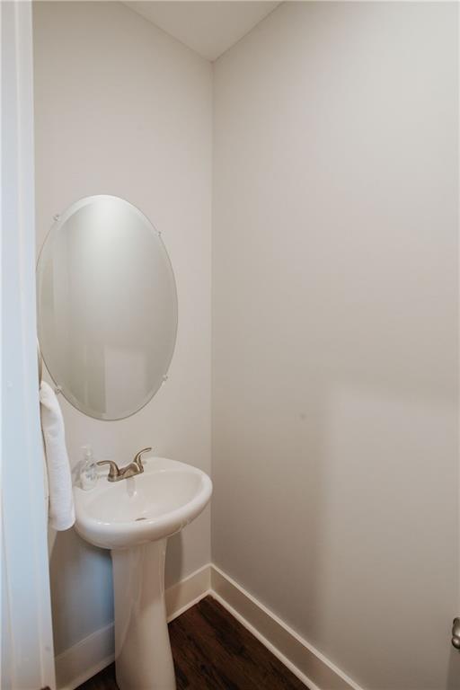 3221 Hollonville Road Williamson, GA 30292 - Photo 25 of 46 a bathroom with a sink and mirror