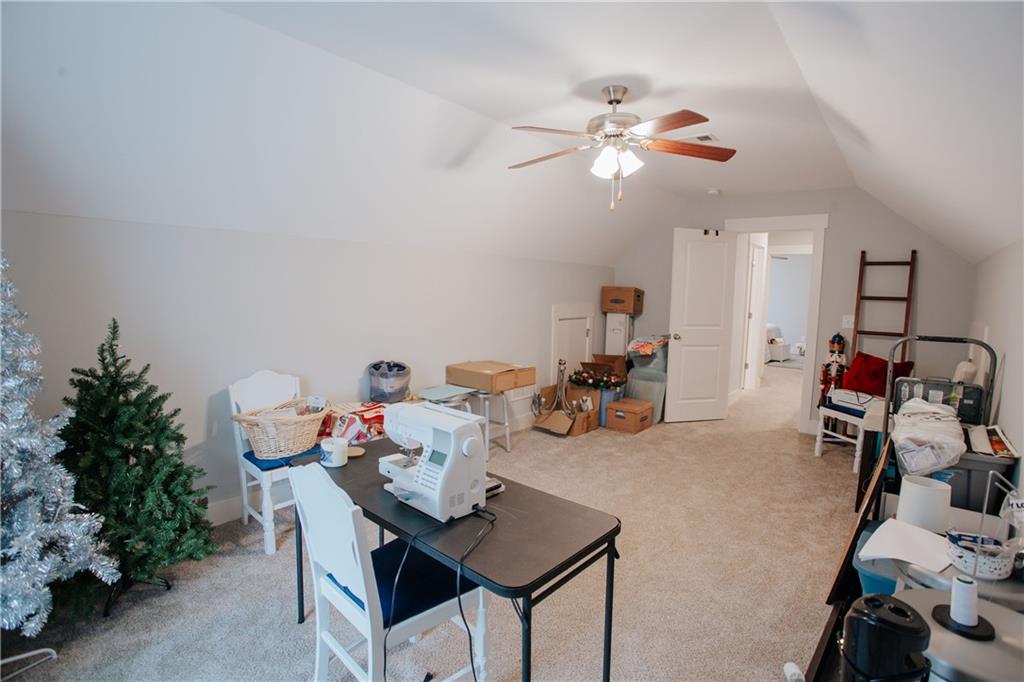 3221 Hollonville Road Williamson, GA 30292 - Photo 34 of 46 a view of a workspace with furniture