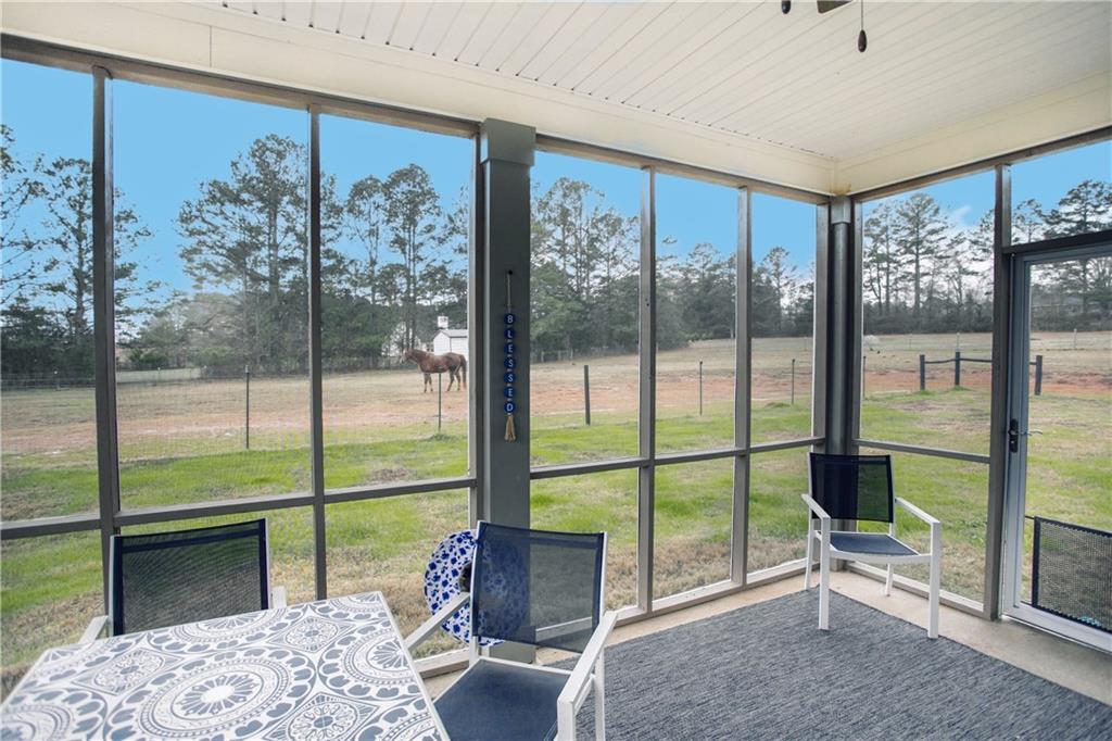 3221 Hollonville Road Williamson, GA 30292 - Photo 40 of 46 a living room with hardwood floor and balcony