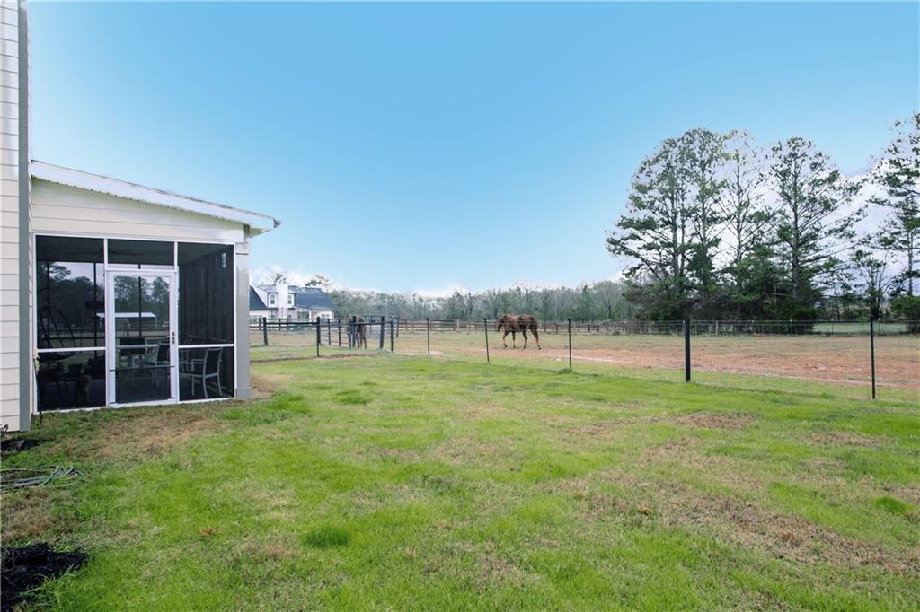 3221 Hollonville Road Williamson, GA 30292 - Photo 41 of 46 a view of a green field
