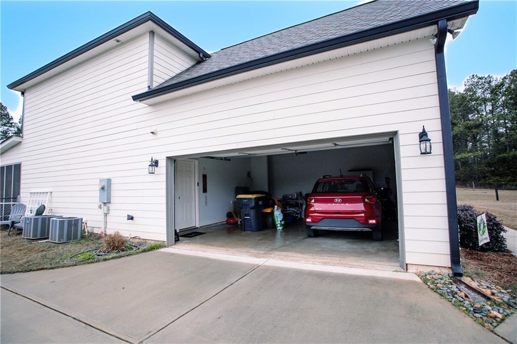 3221 Hollonville Road Williamson, GA 30292 - Photo 44 of 46 a view of a car in front of house