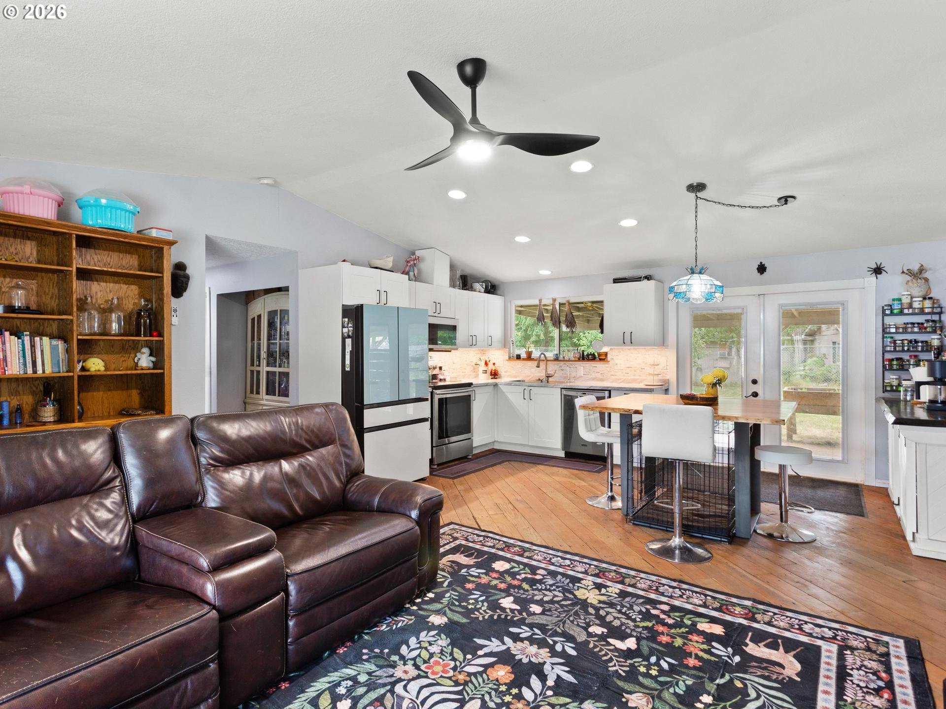 1719 Southwest 1st Street Battle Ground, WA 98604 - Photo 13 of 37 a living room with furniture kitchen view and a table