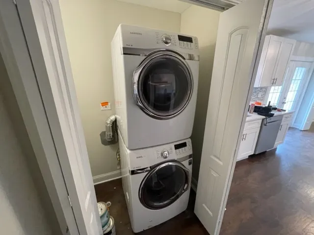 a bathroom with a sink mirror vanity and toilet