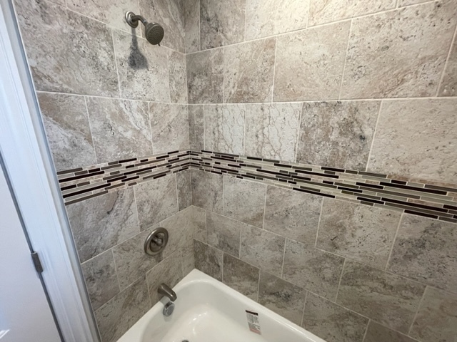 15303 Birch Road Markham, IL 60428 - Photo 3 of 12 a bathroom with a shower and a sink