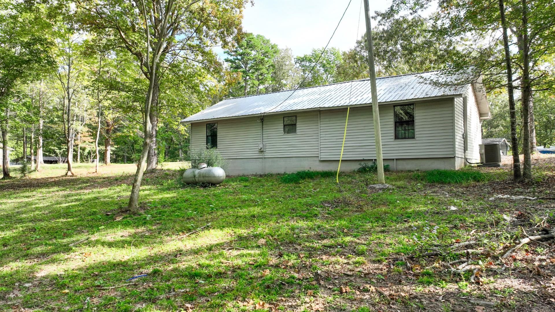 52 Cr 341 Road Iuka, MS 38852 - Photo 24 of 28 a backyard of a house with lots of green space