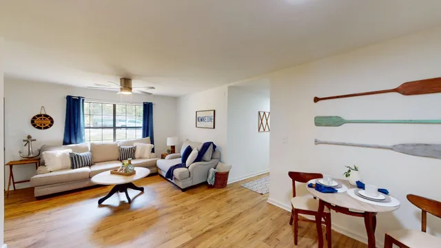 a living room with furniture and a window