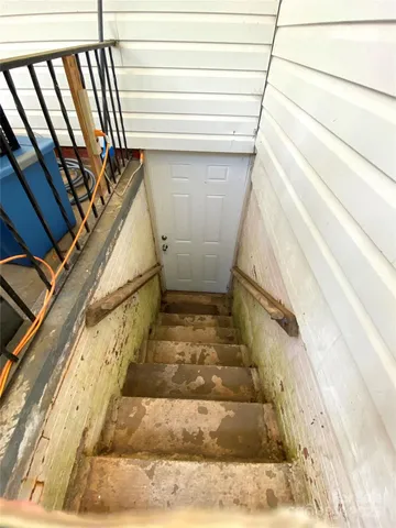a kitchen with a sink and a window