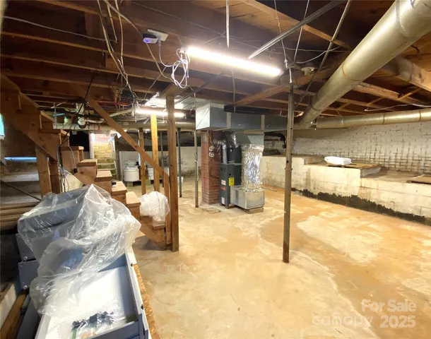 a kitchen with a refrigerator and a sink