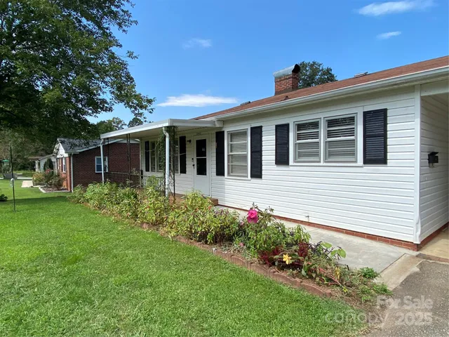 a view of a house with garden