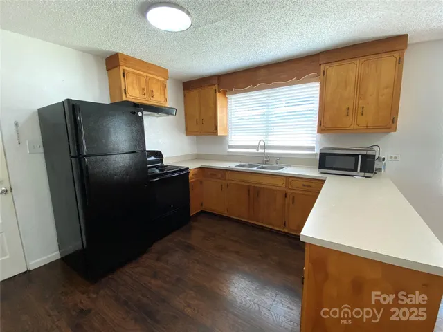 a bathroom with a shower and a toilet