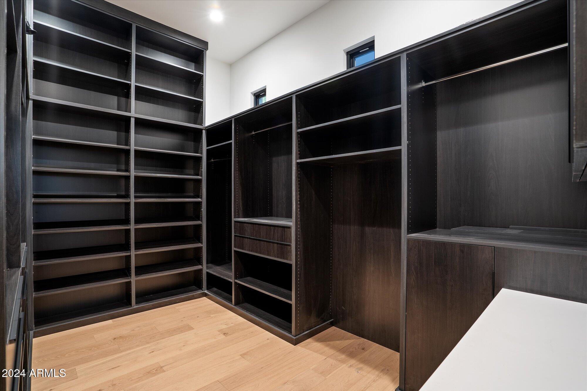 10249 East Joy Ranch Road Scottsdale, AZ 85262 - Photo 26 of 56 Primary Closet with Wolf Refrigerator!
