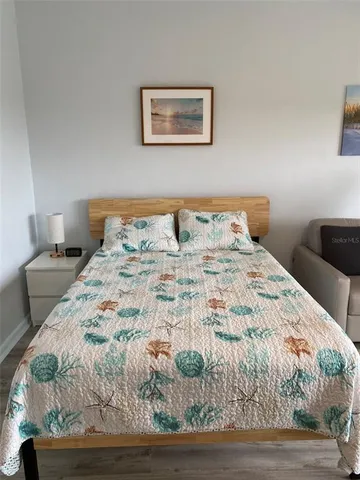 a view of a sign board with a yard