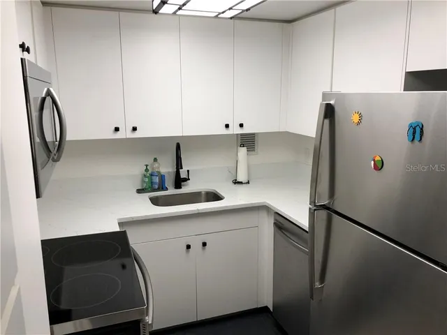 a bathroom with a sink and toilet