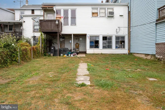 a view of house with outdoor space