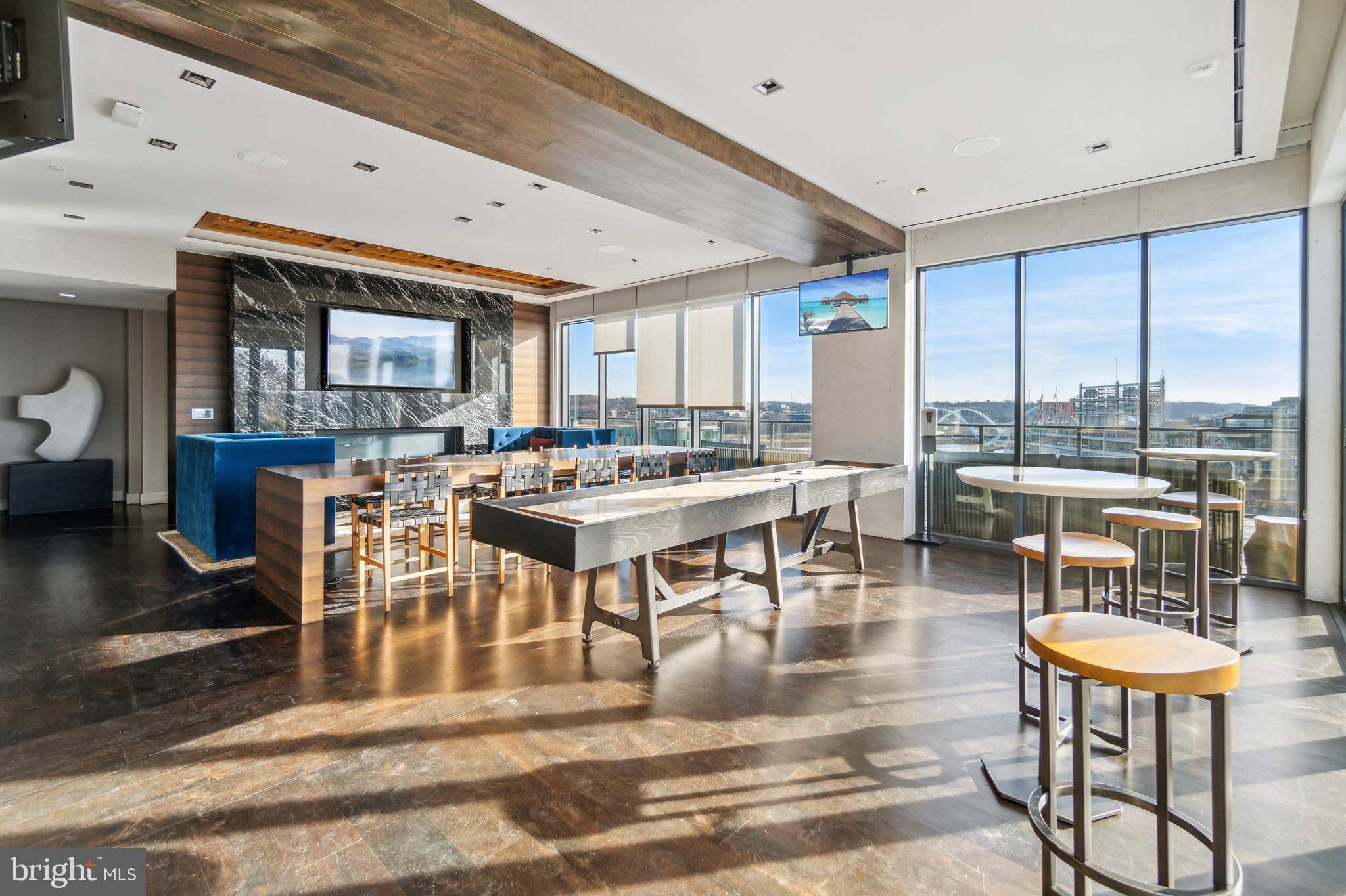 70 N Street Southeast, Unit 813 Washington, DC 20003 - Photo 23 of 30 Roof top indoor social space. Complete with TVs