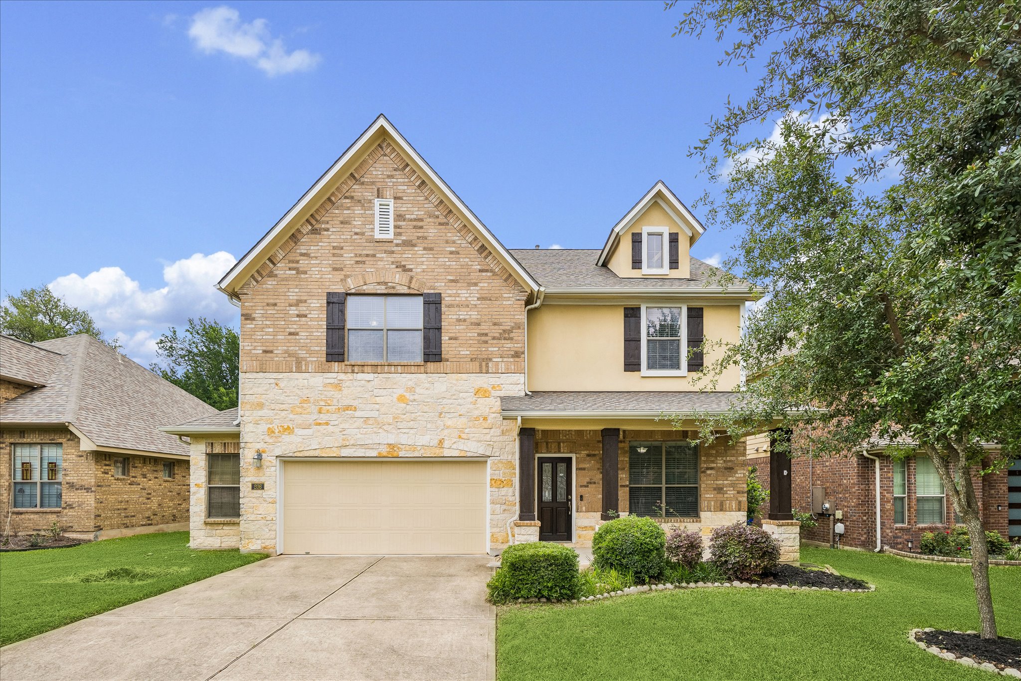 206 Saddle Ridge Drive Cedar Park, TX 78613 - Photo 1 of 20 a front view of a house with garden