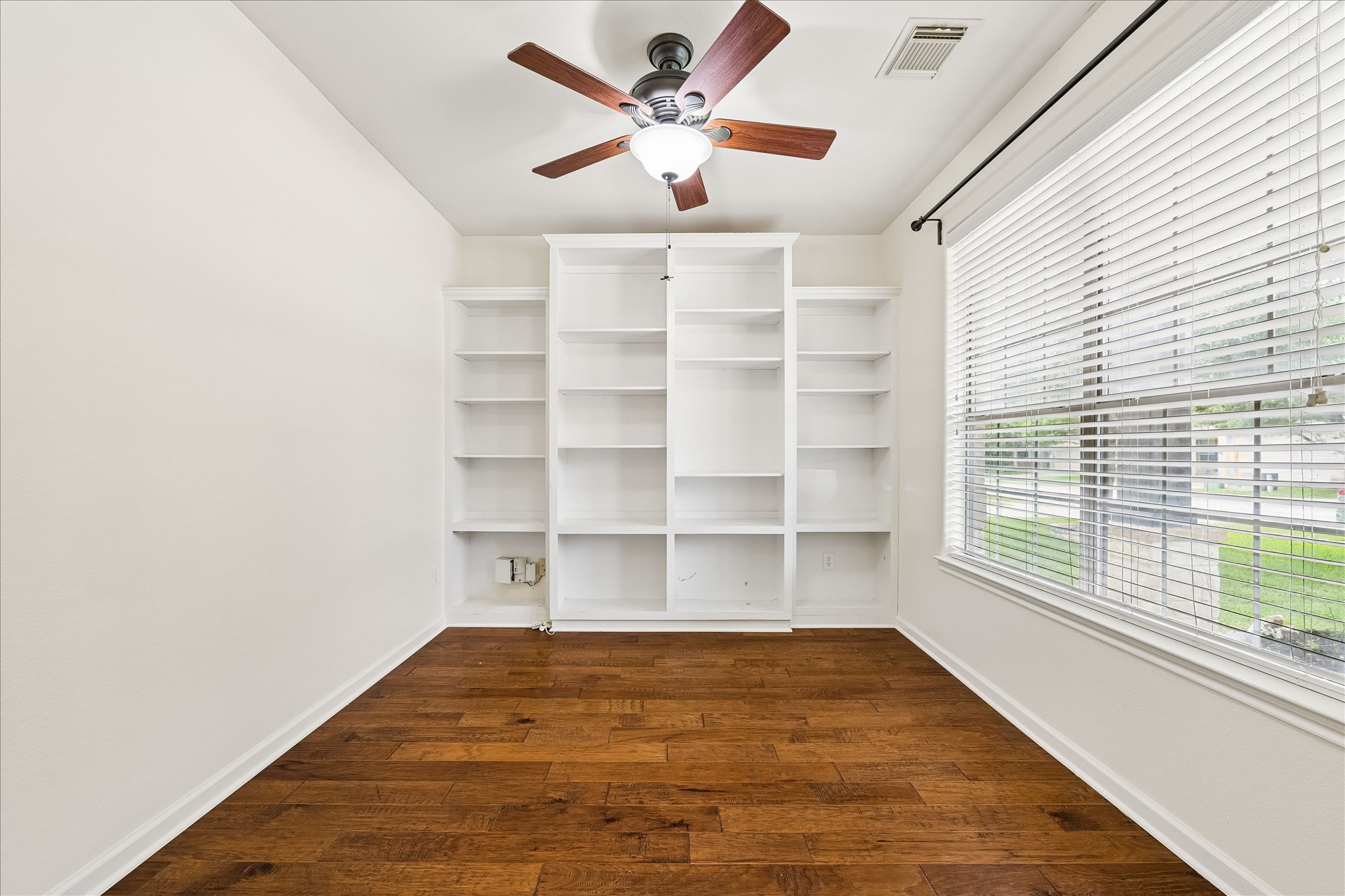 206 Saddle Ridge Drive Cedar Park, TX 78613 - Photo 12 of 20 a view of an empty room with a window