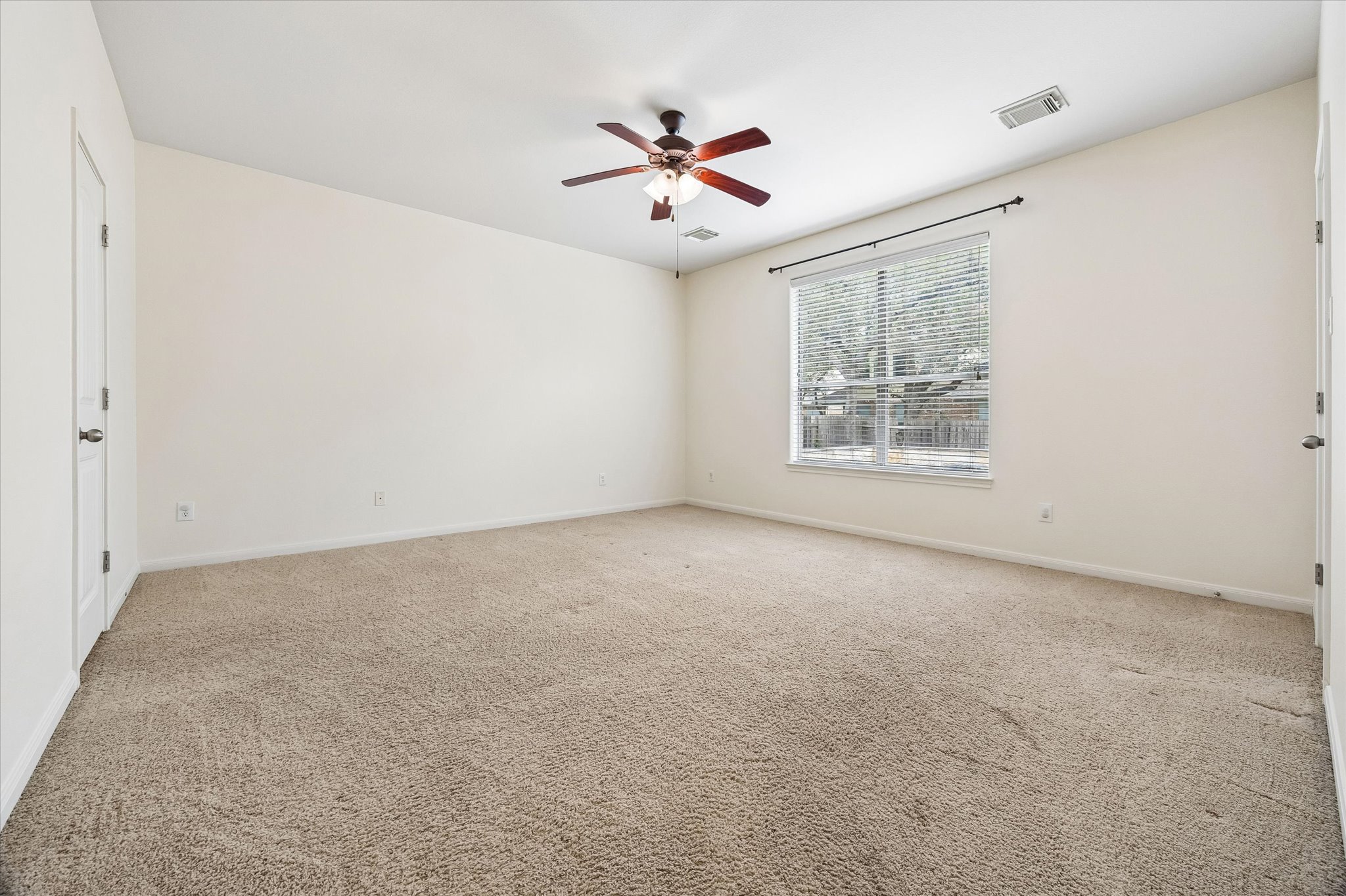 206 Saddle Ridge Drive Cedar Park, TX 78613 - Photo 8 of 20 a view of an empty room with a window