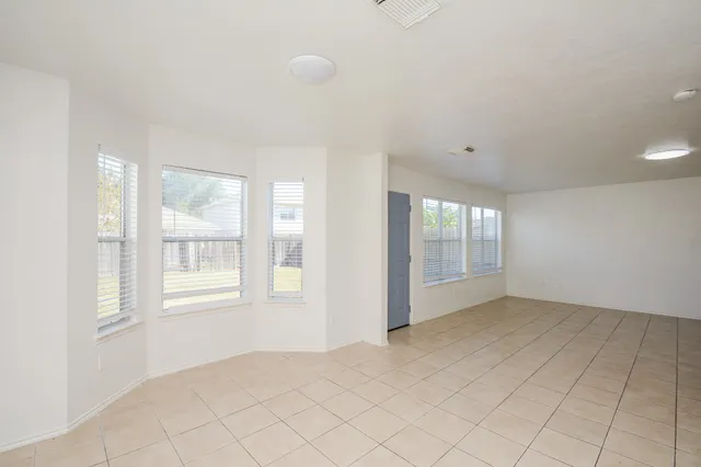 an empty room with windows