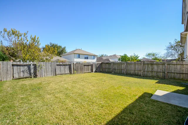 a view of a house with swimming pool