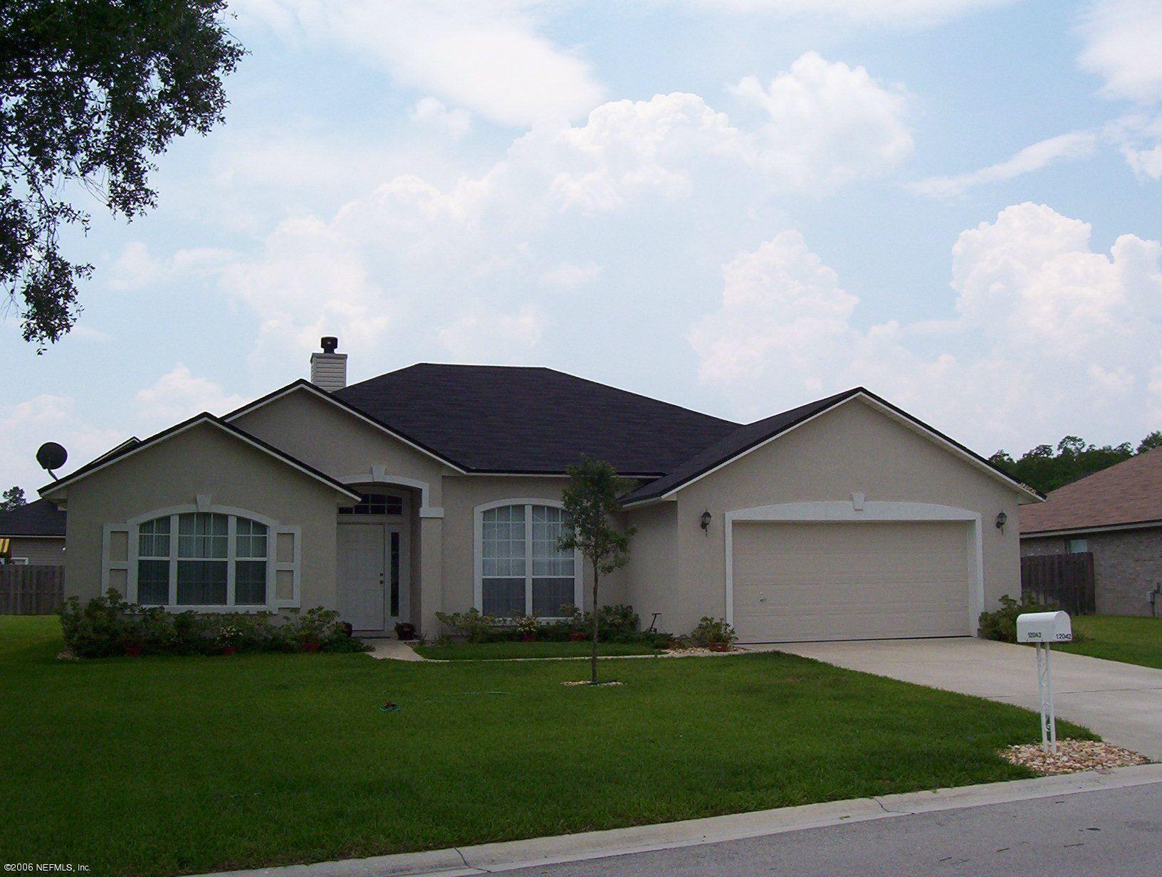 12042 Spring Ridge Drive Jacksonville, FL 32258 - Photo 1 of 13 Front