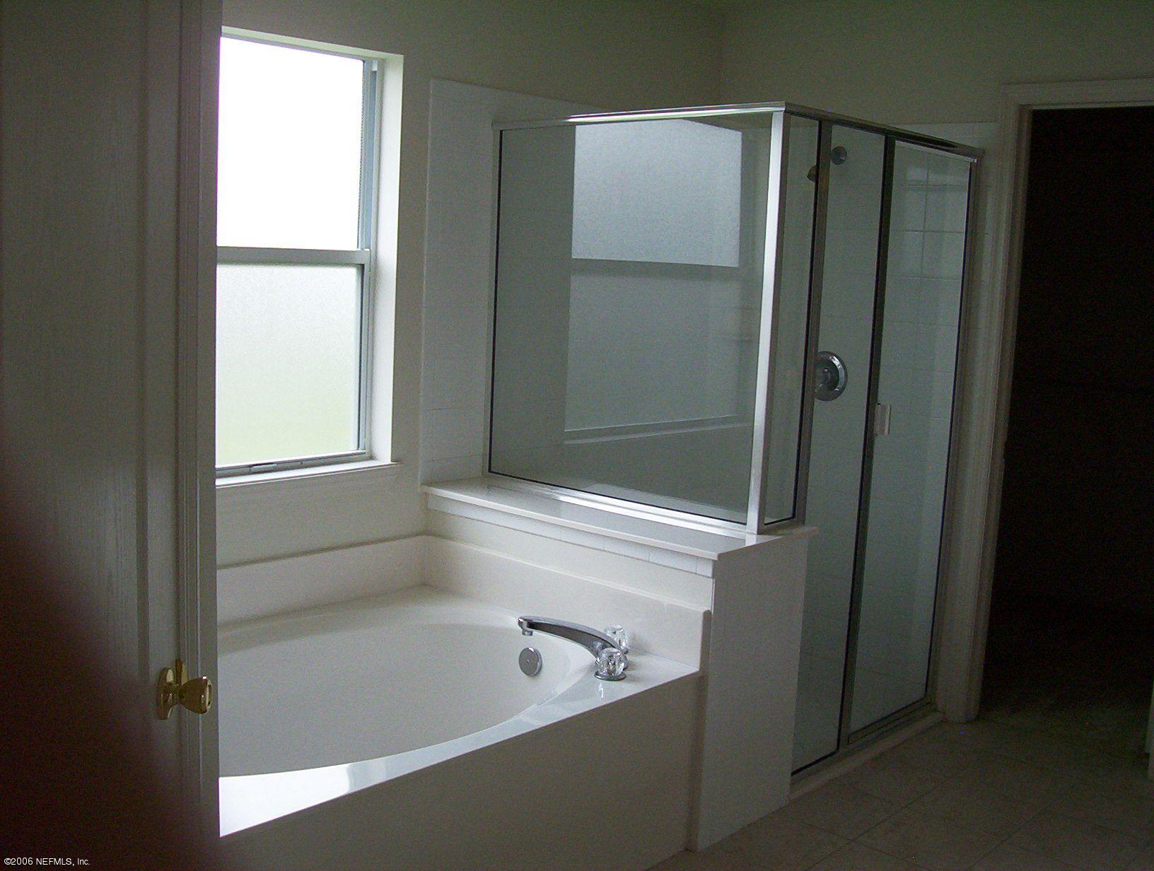 12042 Spring Ridge Drive Jacksonville, FL 32258 - Photo 9 of 13 Master Bath tub & shower