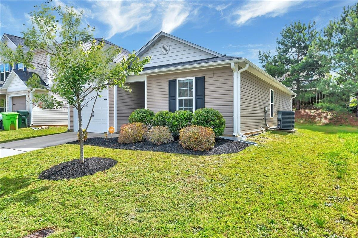 1621 Brownairs Lane Raleigh, NC 27610 - Photo 2 of 29 a house view with a garden space