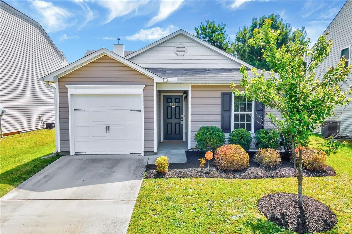 1621 Brownairs Lane Raleigh, NC 27610 - Photo 23 of 29 a front view of house with yard and outdoor seating