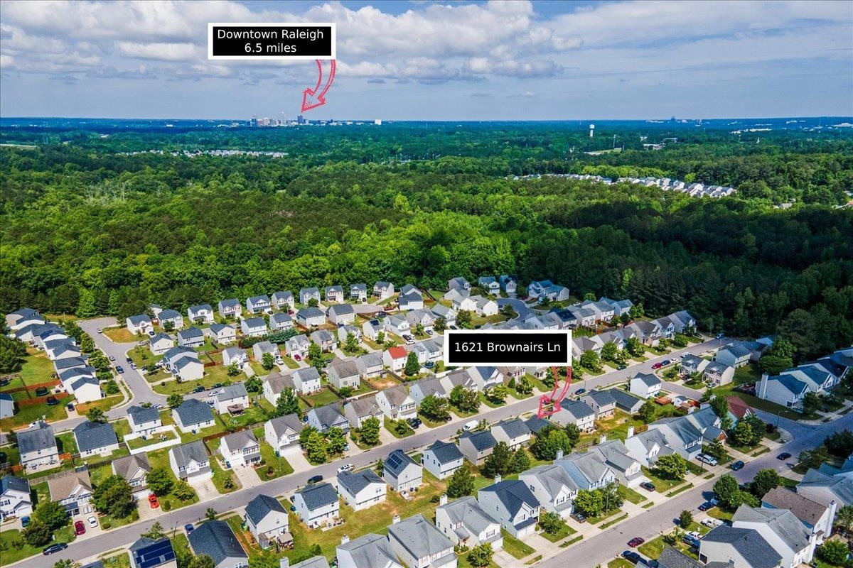 1621 Brownairs Lane Raleigh, NC 27610 - Photo 29 of 29 a view of a book with a garden