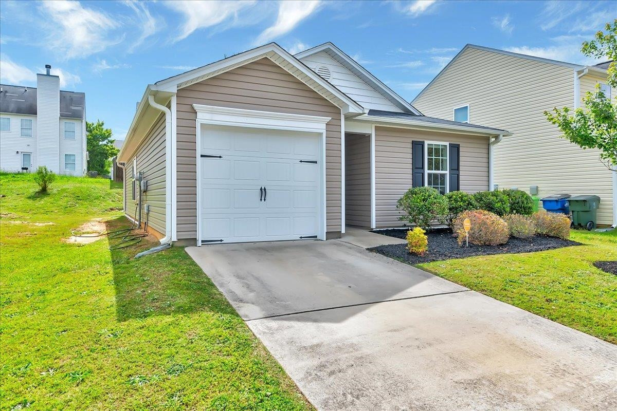 1621 Brownairs Lane Raleigh, NC 27610 - Photo 3 of 29 a front view of house with yard and green space