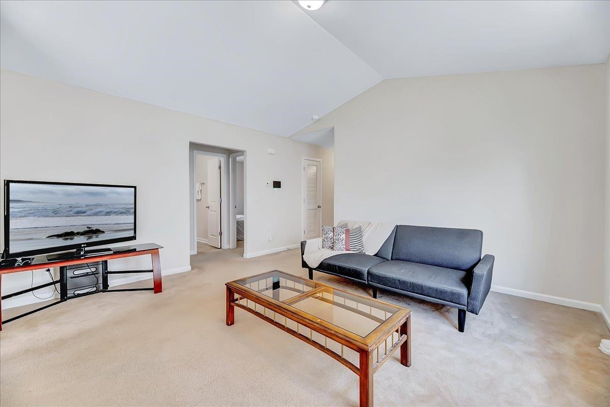 1621 Brownairs Lane Raleigh, NC 27610 - Photo 6 of 29 a living room with furniture and a flat screen tv