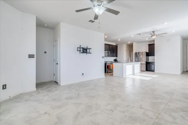 a view of a kitchen with furniture and a kitchen