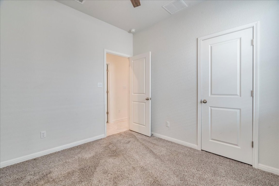 101 Otella Street Georgetown, TX 78628 - Photo 23 of 33 a view of an empty room and entryway