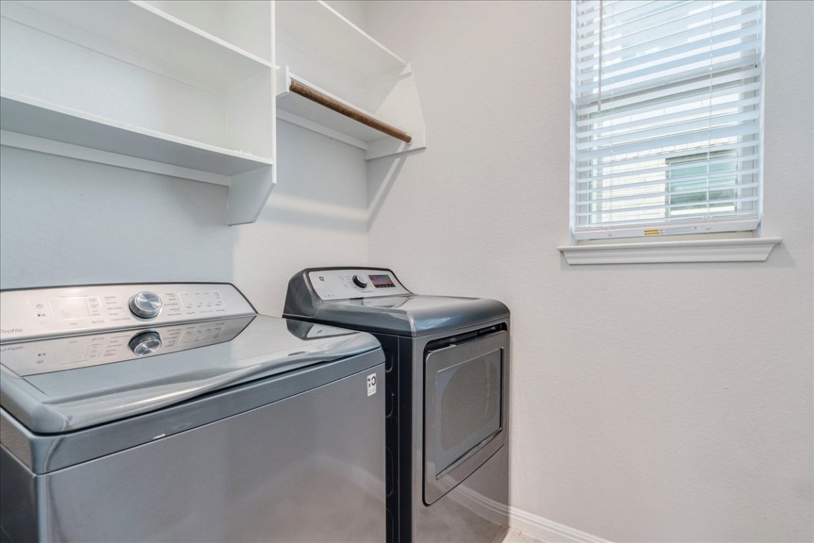 101 Otella Street Georgetown, TX 78628 - Photo 24 of 33 a utility room with dryer and washer