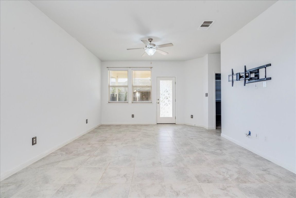 101 Otella Street Georgetown, TX 78628 - Photo 10 of 33 a view of an empty room with a window